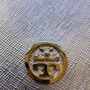 Morden gold Tory Burch clutch